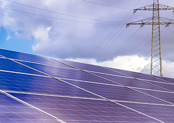 Solar panels and electricity mast